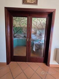 Porta scorrevole due ante in vetro
