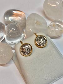 Orecchini a clip in oro giallo e zirconi