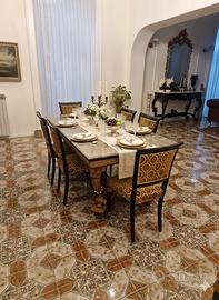 Tavolo in marmo con sedie