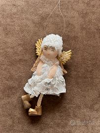 Angioletto natalizio decorativo con ali dorate