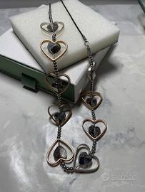 Collana con 9 cuori dorati e in pietra