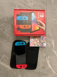 Nintendo switch oled con gioco e custodia