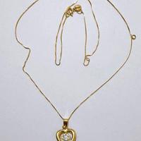Collana punto luce a cuore in oro giallo 18kt 750