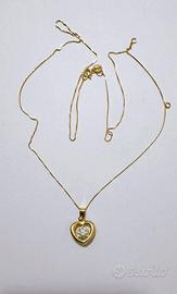 Collana punto luce a cuore in oro giallo 18kt 750