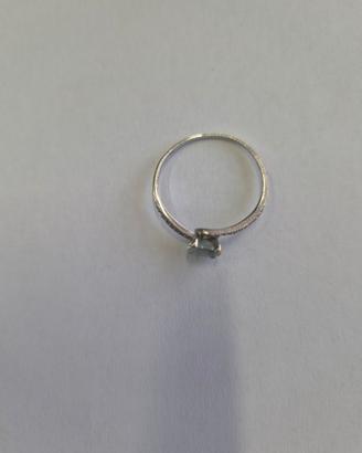 anello oro bianco con topazio azzurro e brillantin