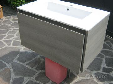 Piano lavabo in corian opaco con mobile sospeso