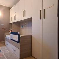 Armadio a ponte con doppio materasso