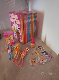 Lotto bambole winx libri portachiavi ecc.