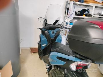 Tricity 125