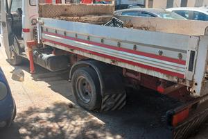 autocarro ribaltabile marciante
