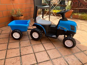 Trattore New Holland con rimorchio