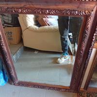 Specchio con cornice lavorata
