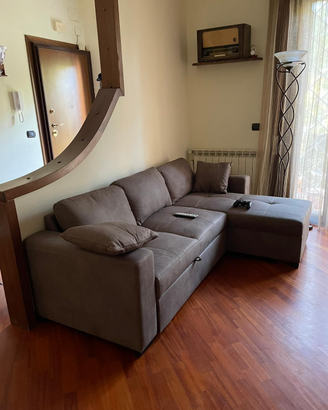 Divano con penisola e letto estraibile