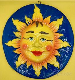 Sole in terracotta altorilievo