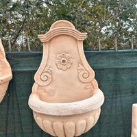 Fontana da giardino a parete in cemento