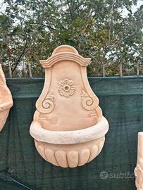 Fontana da giardino a parete in cemento