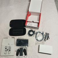 Nintendo switch oled+ gioco+ custodia