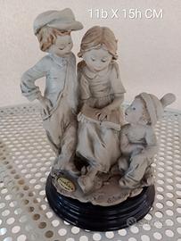 Giuseppe Armani Florence Scultura bambini con libr