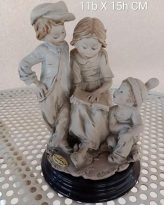 Giuseppe Armani Florence Scultura bambini con libr