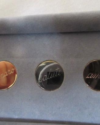 Piastre augurali in oro 18 kt.