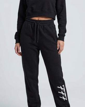 Tuta sportiva nera Triplosette 777 felpa pantaloni