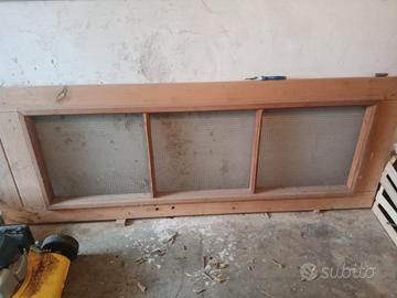 Porta in legno con zanzariera