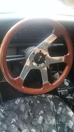 Volante Momo legno anni 80