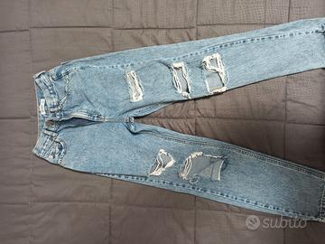 Jeans donna taglia 32 con strappi avanti
