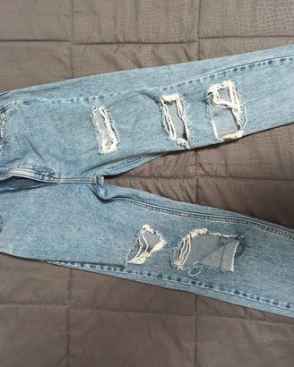 Jeans donna taglia 32 con strappi avanti