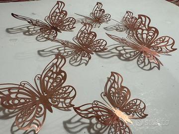Farfalle adesive da parete 3D traforate rosa