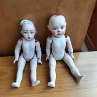 Coppia bambole in porcellana bisquit.