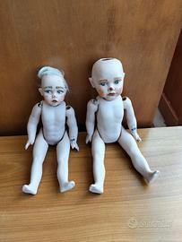 Coppia bambole in porcellana bisquit.