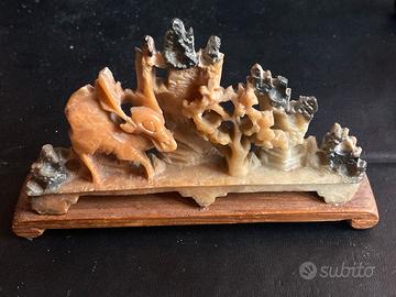 Scultura con cervo un'opera augurale cinese