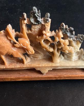 Scultura con cervo un'opera augurale cinese