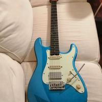 Chitarra elettrica, amplificatore, cuffia ampli.