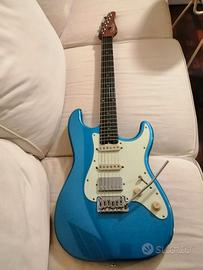 Chitarra elettrica, amplificatore, cuffia ampli.