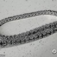 BRACCIALE TENNIS ORO 18kt. CON SMERALDI NATURALI