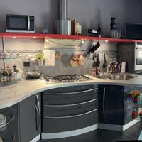 Cucina Snaidero completa con tavolo e frigo grande