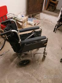 sedia a rotelle con poggia gambe richiudibile comp