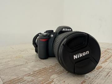 Nikon D3100 + 18-105 VR