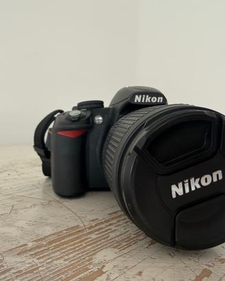 Nikon D3100 + 18-105 VR
