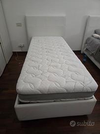 Letti con contenitore in eco pelle.