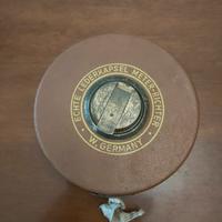 Antico metro a rollina in bachelite,bronzo e tela 