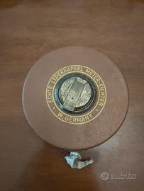 Antico metro a rollina in bachelite,bronzo e tela 