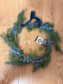 Ghirlanda natalizia con bacche