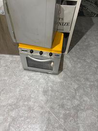 cucina da campeggio e frigo compreso di bombola