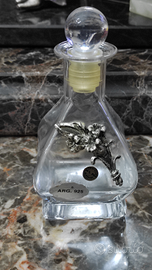 Bottiglia in cristallo con fiori in Argento