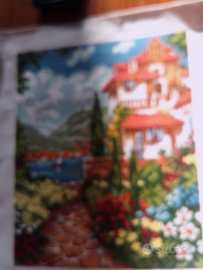 Ricamo a punto croce su tela Aida