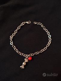 braccialetto argenteo con charms caramella