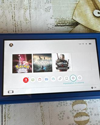 Nintendo Switch Lite + giochi e custodia